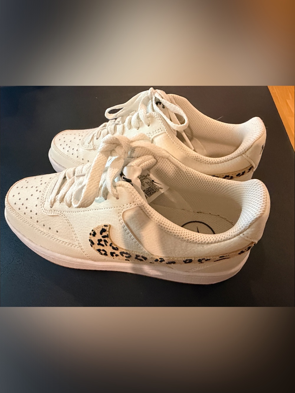 Nike Women’s White Low-Top Sneakers with Leopard Swoosh Accent